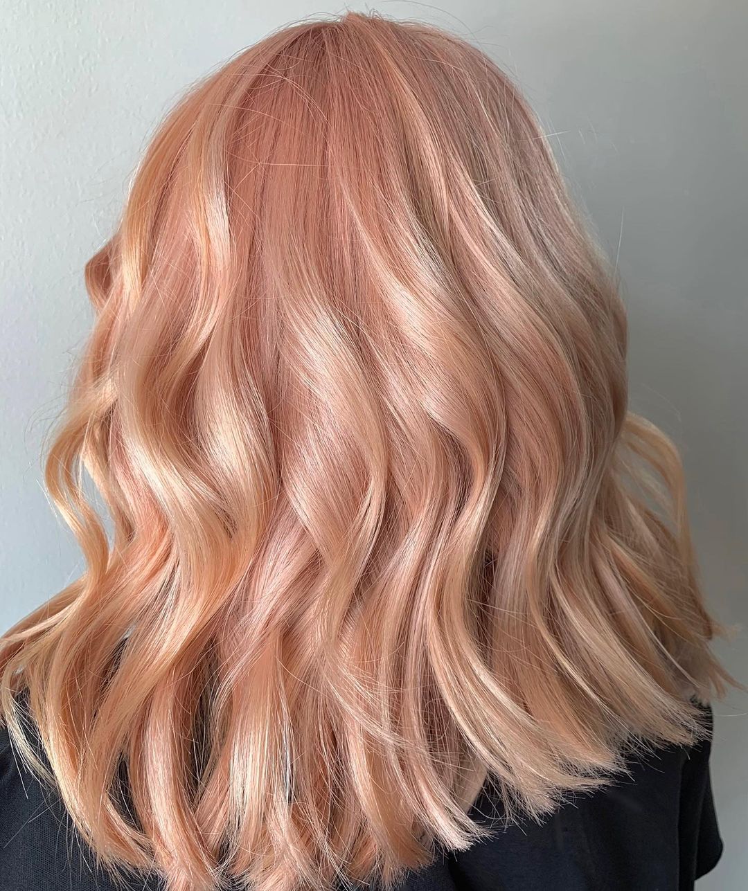 Rose Gold Strawberry Blonde with Peach Undertone