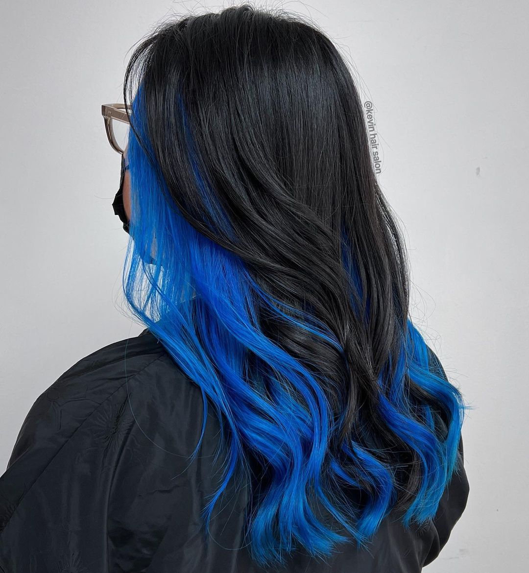 Blue Peekaboo on Long Wavy Black Hair
