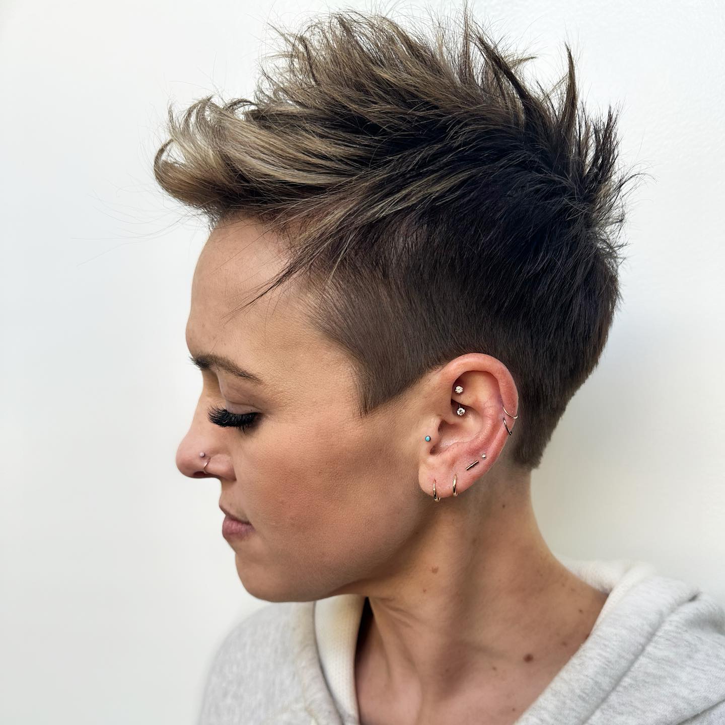Spiky Pixie Cut with Blonde Highlights