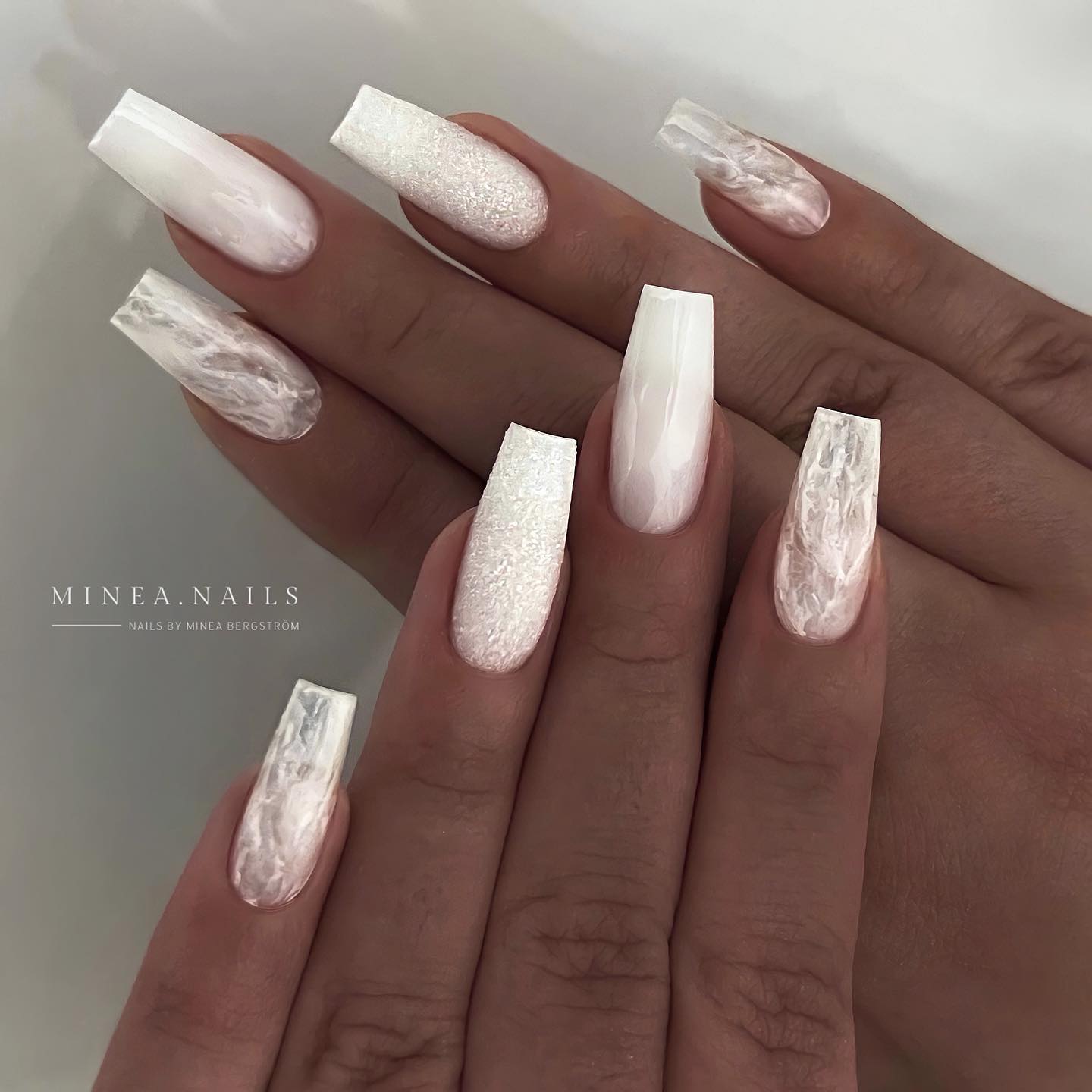 White Manicure with Marble Design and Glitter