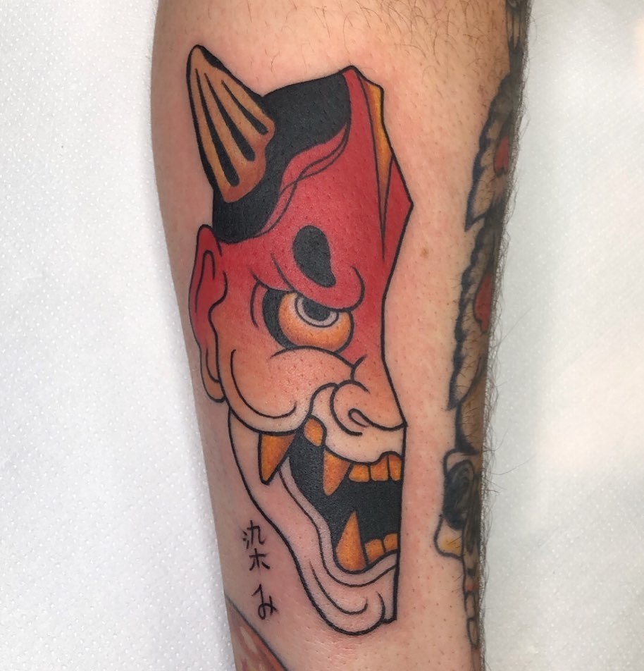 Half Mask Japanese Tattoo on Leg