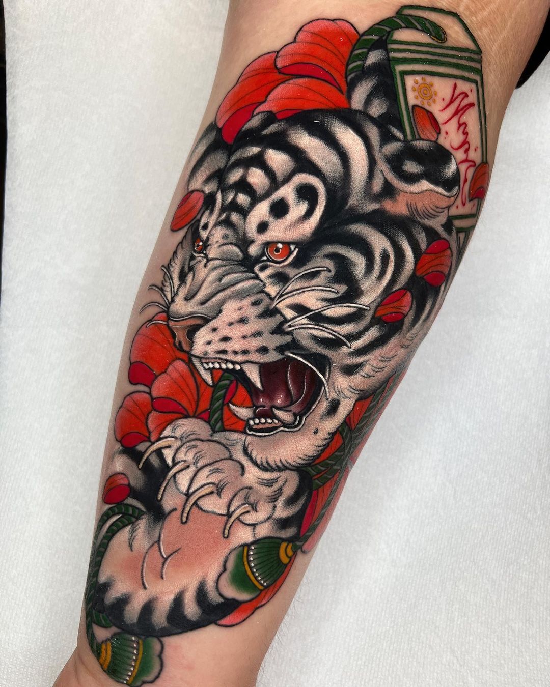 Red and Black Japanese Tiger Tattoo on Arm
