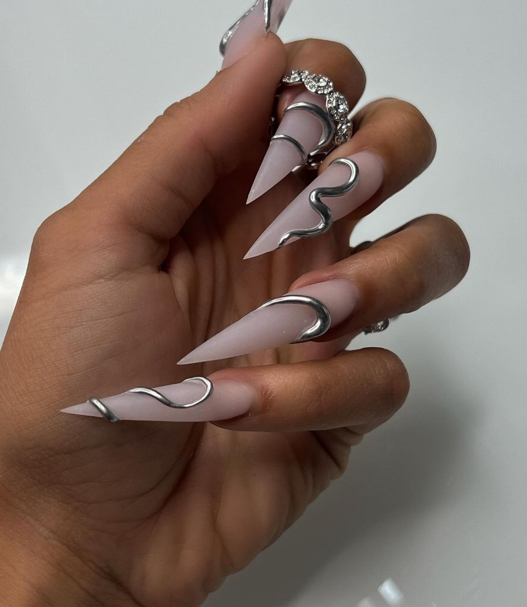 Stiletto Matte Nails with Silver Chrome Design