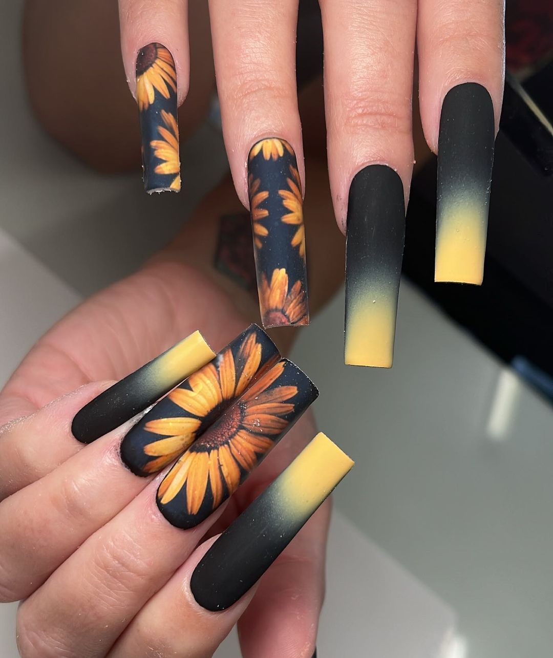 Long Matte Black Nails with Sunflower Design