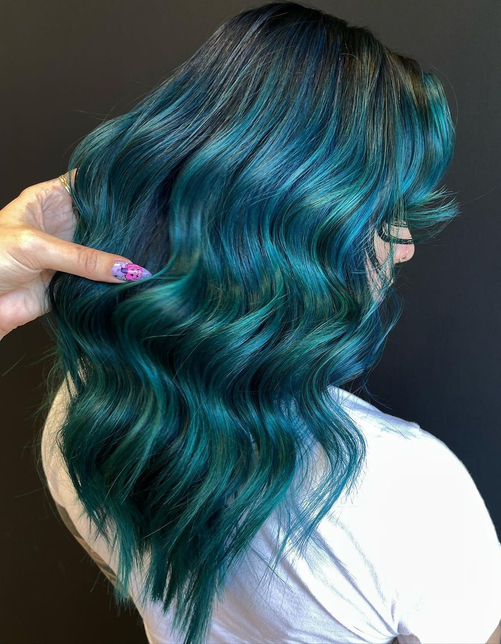 Blue Green Color on Long Wavy Hair