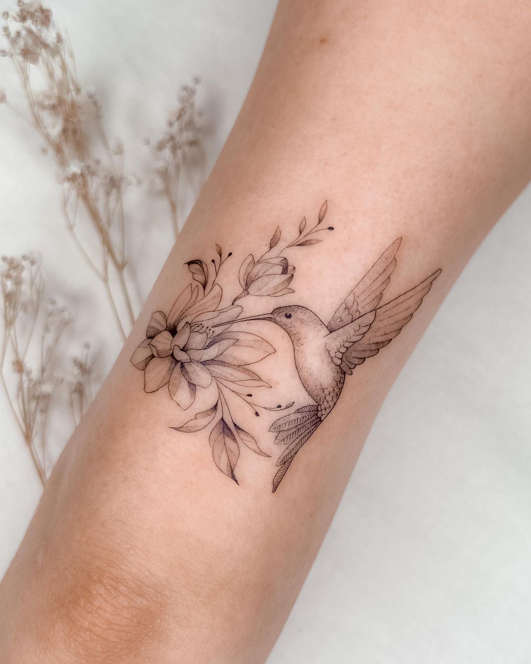 Black and White Hummingbird and Flower Tattoo on Arm