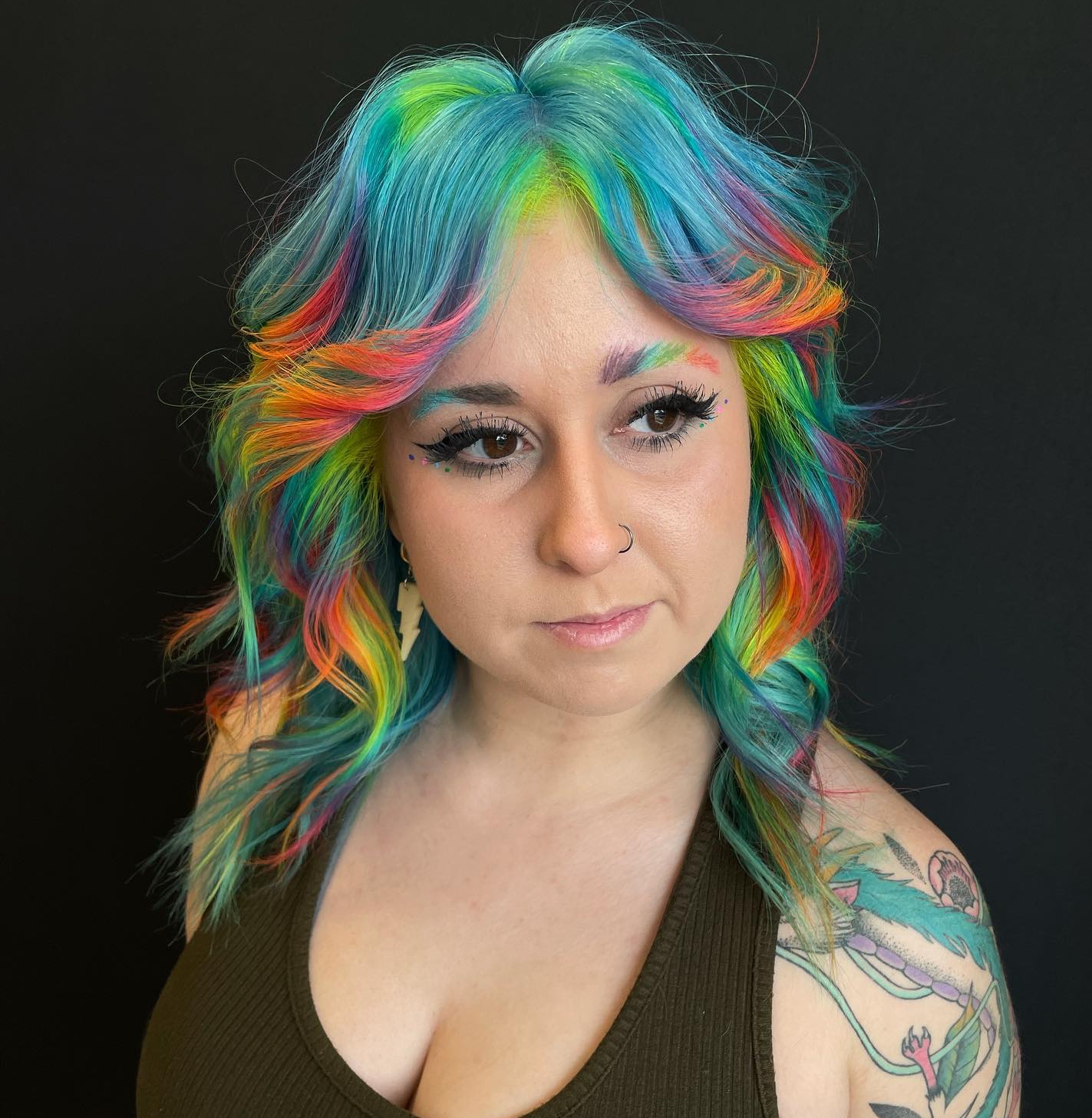 Rainbow Highlights on Shag Turquoise Hair
