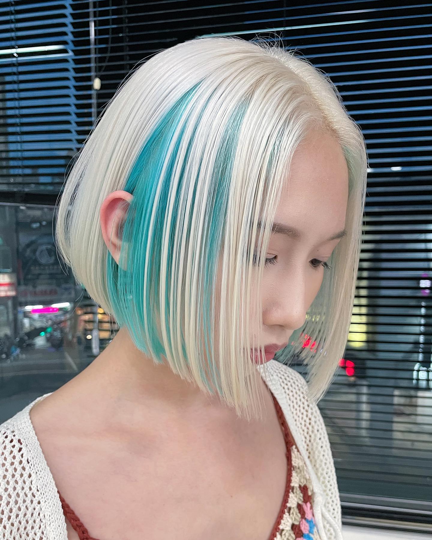 Turquoise Highlight on Short Blonde Hair
