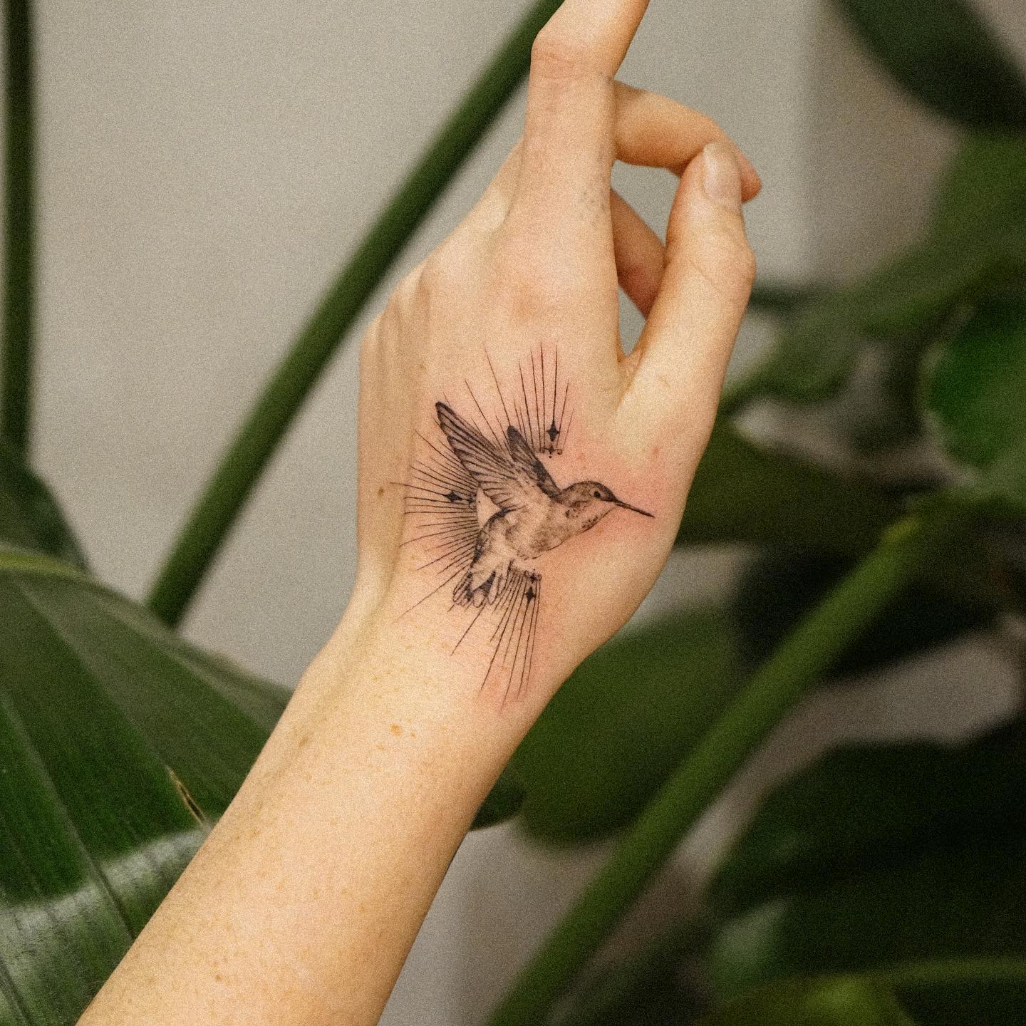 Black and White Hummingbird Tattoo on Hand