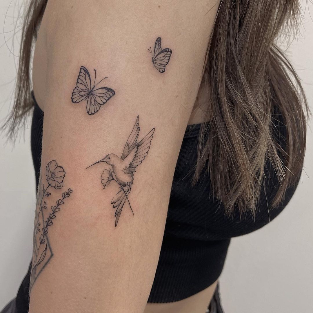 Hummingbird Tattoo with Butterfly and Flowers on Arm