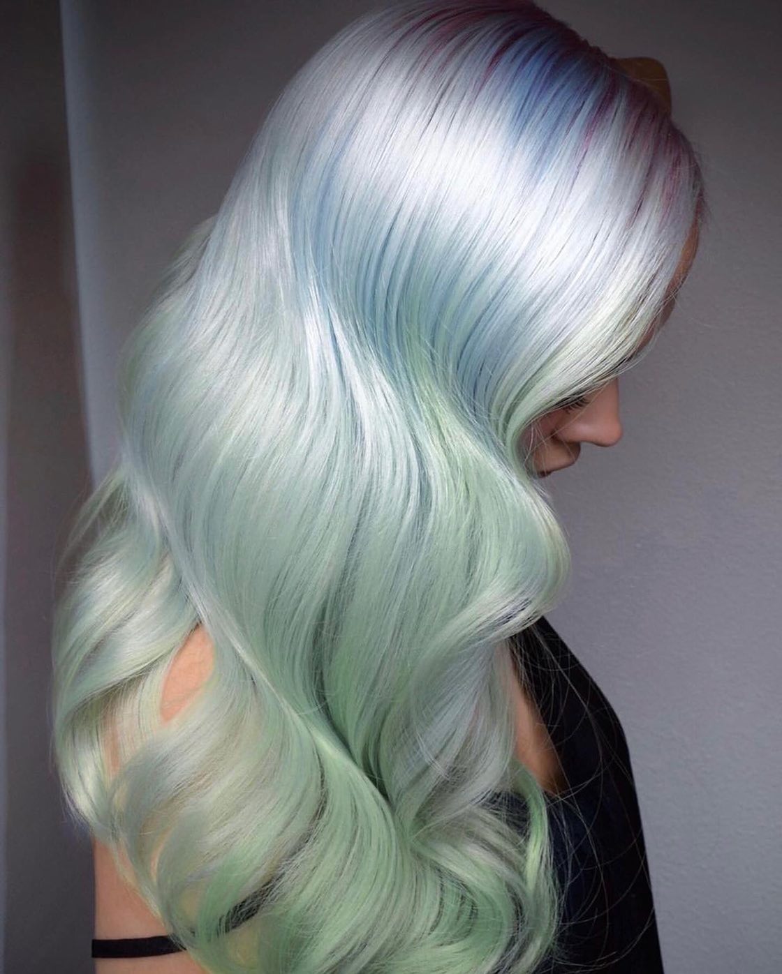 Pastel and Turquoise Shades on Long Wavy Hair