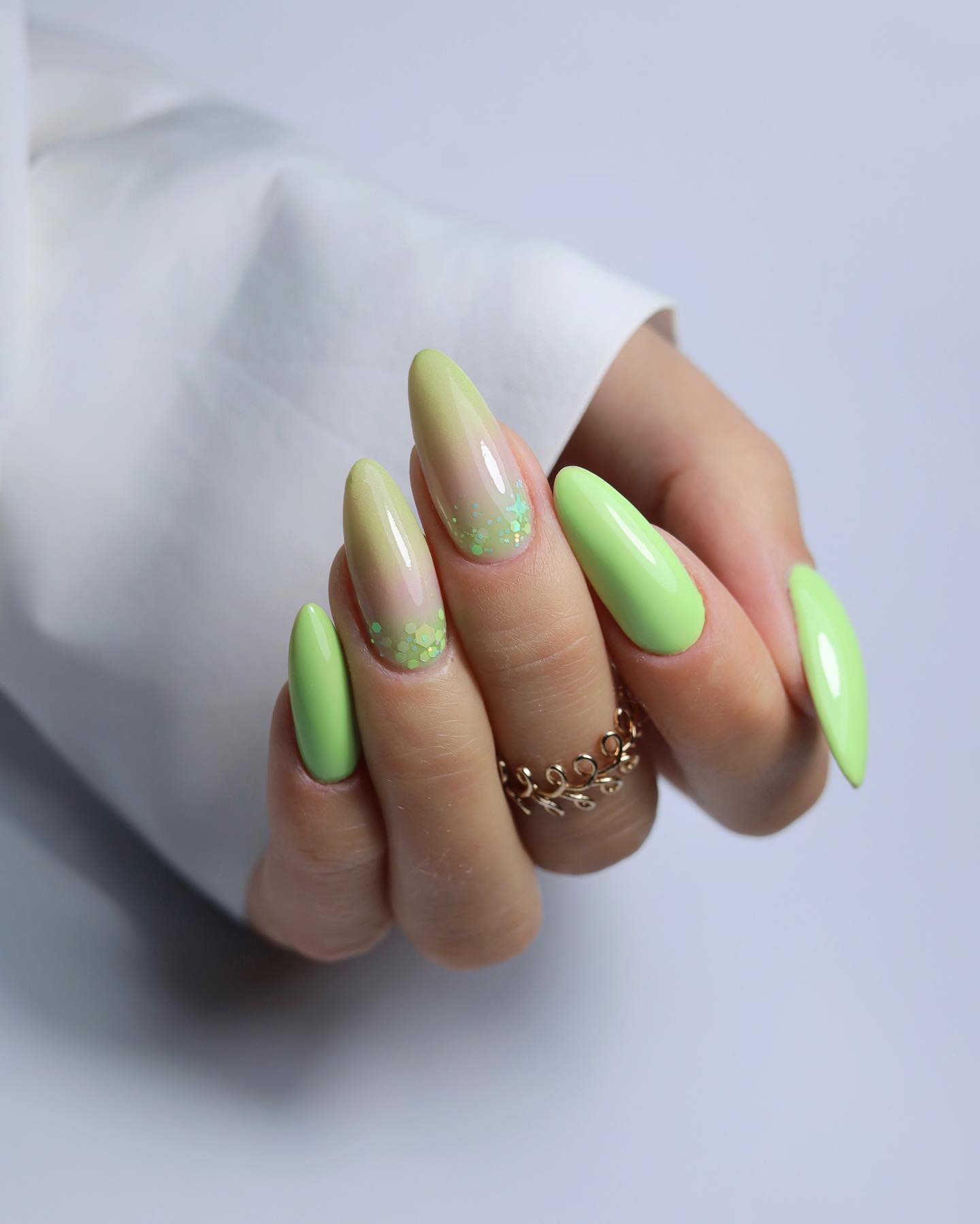 Long Round Pastel Green Nails with Glitter
