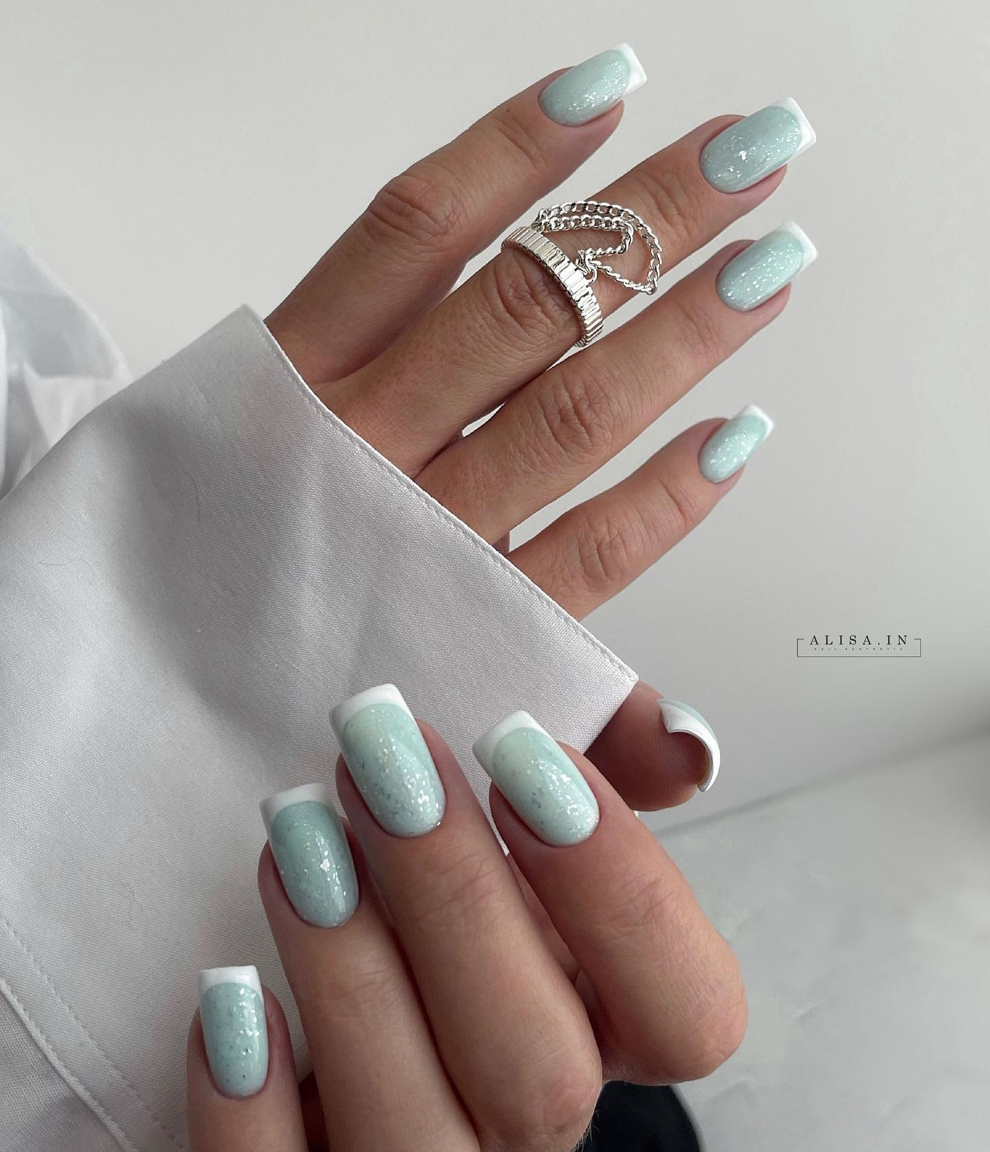 Light Blue Nails with White Tips
