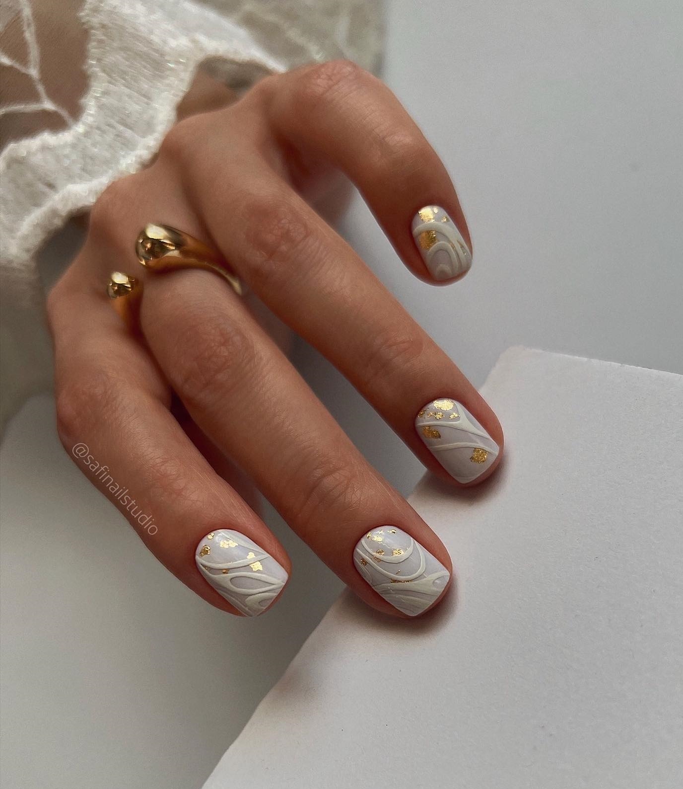 Short White and Gold Nails