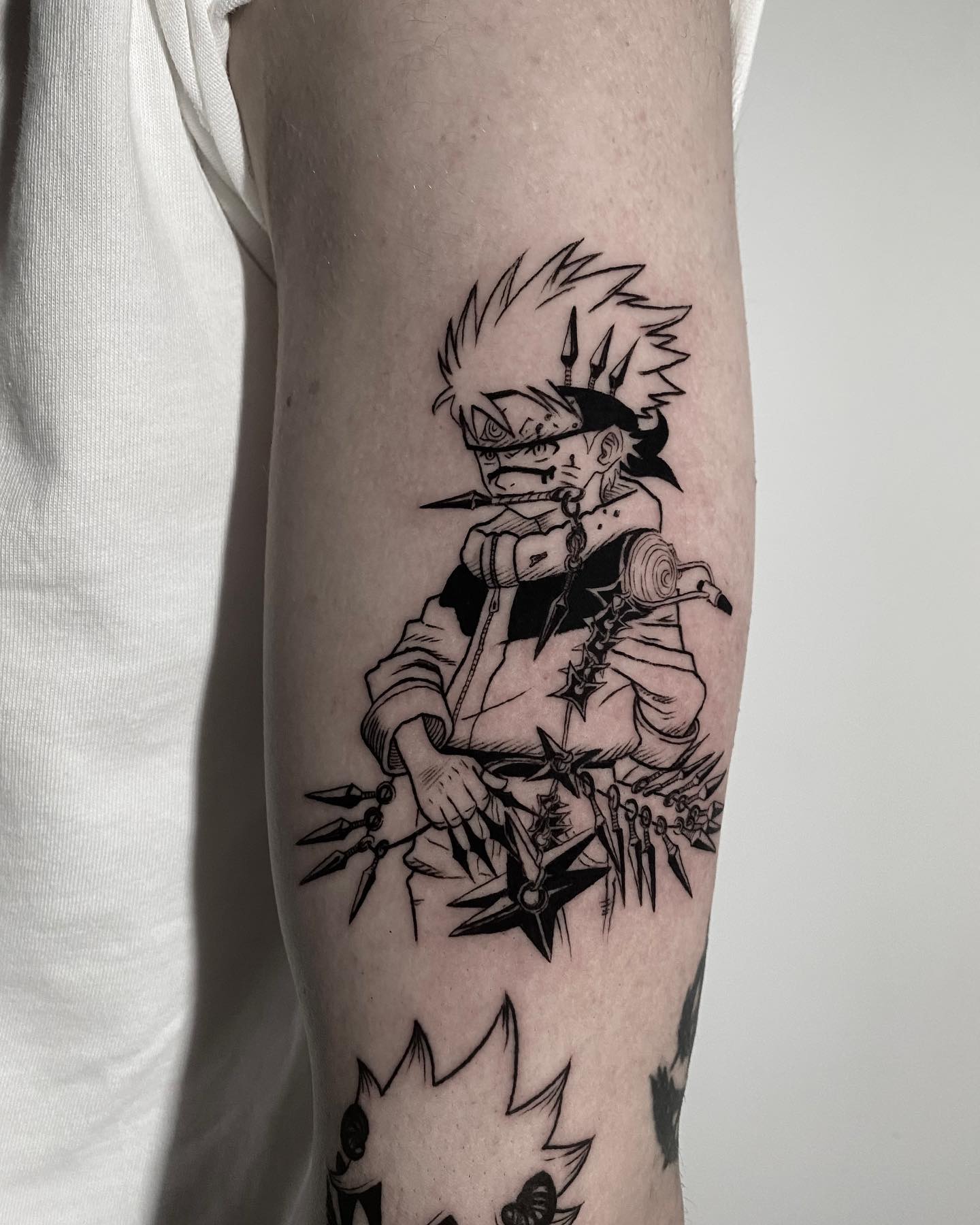 Naruto Uzumaki Tattoo on Arm