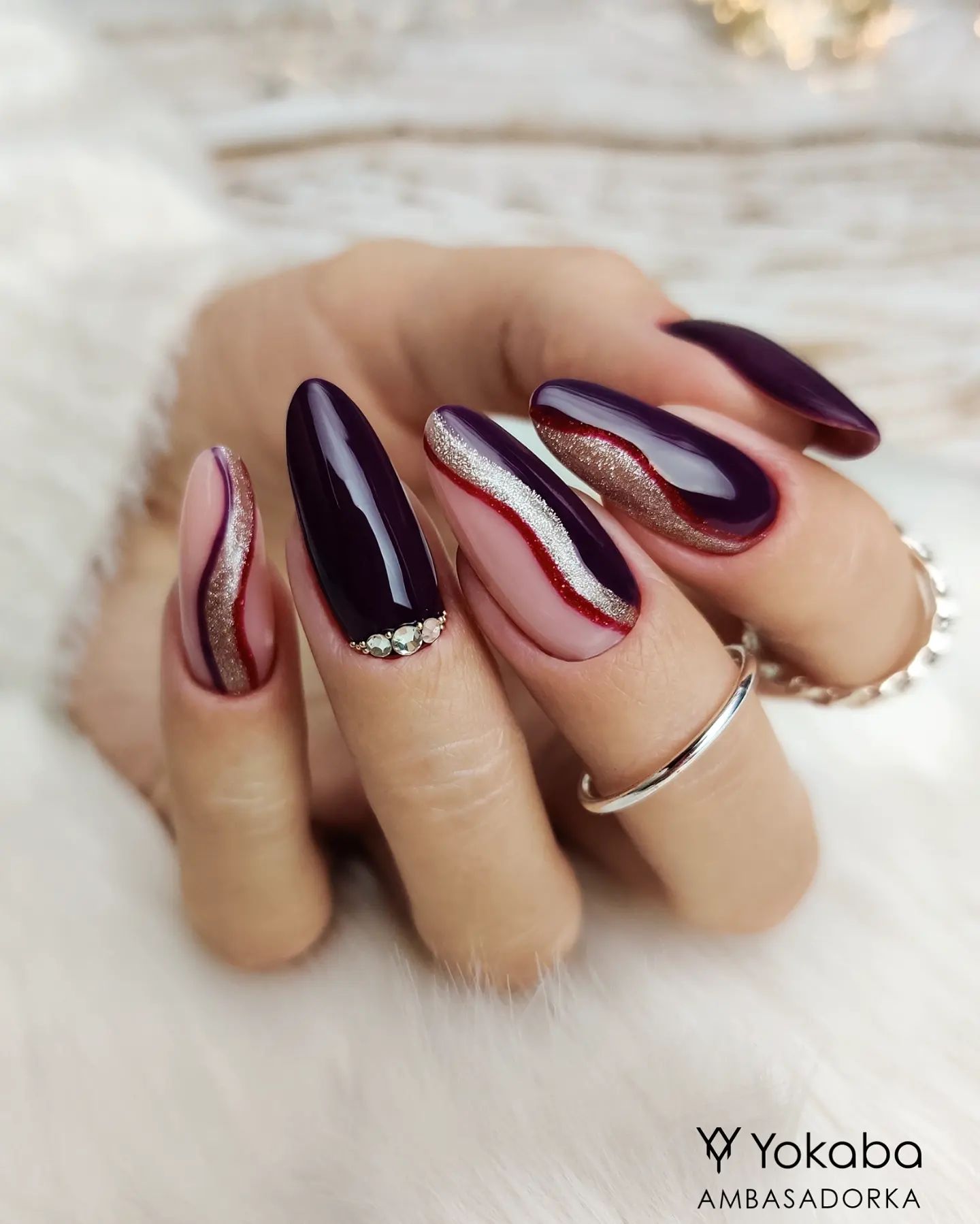 Long Burgundy Nails with Crystals and Silver Swirls