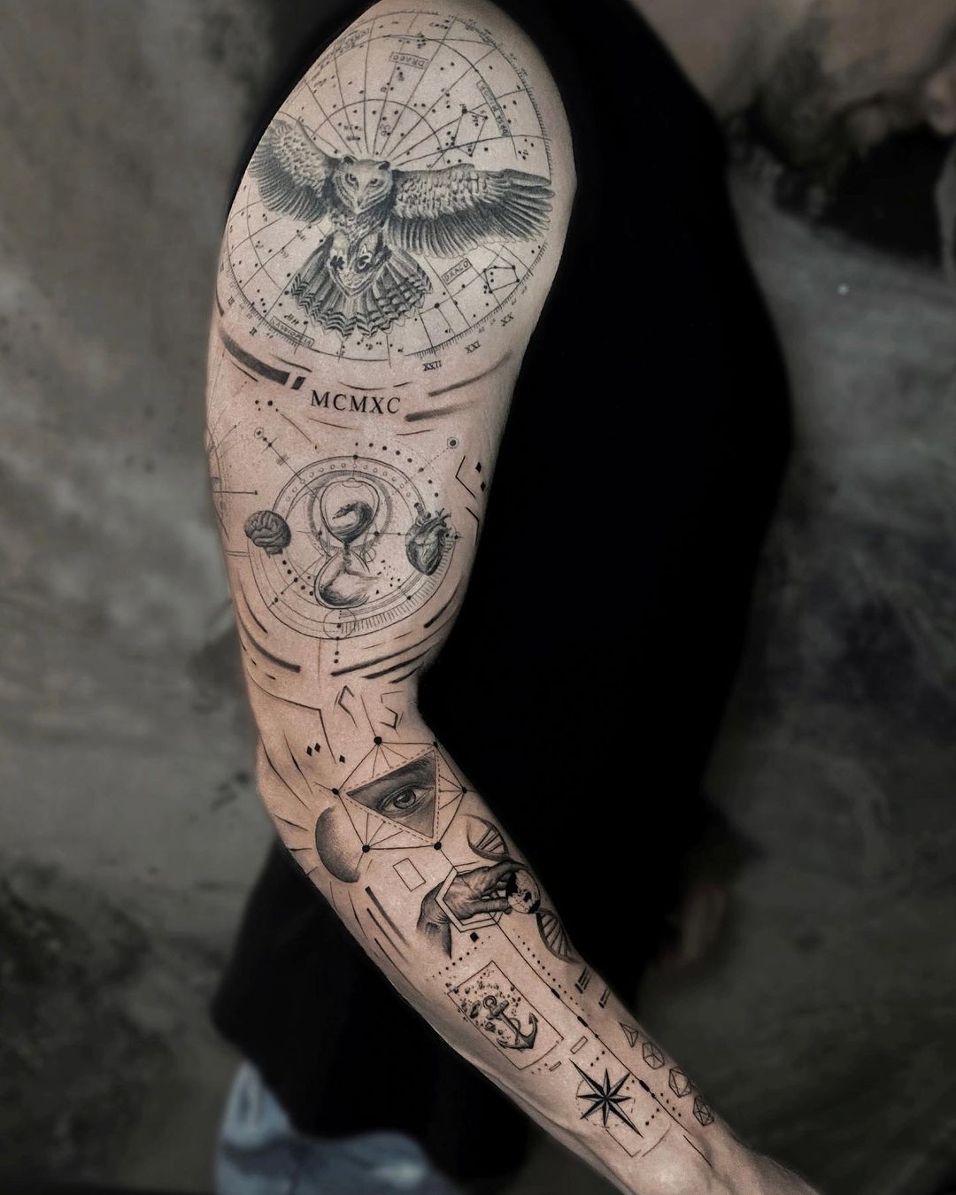 Black 3D Geometric Tattoos on Arm