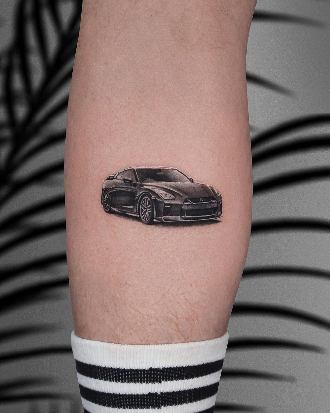 Black 3D Car Tattoo on Arm
