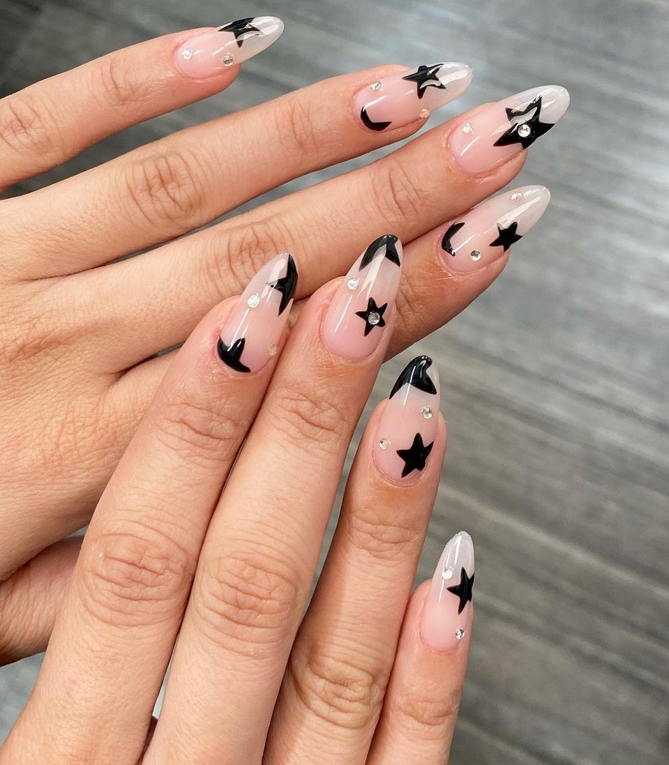 Long Clear and Black Nails with Star Design