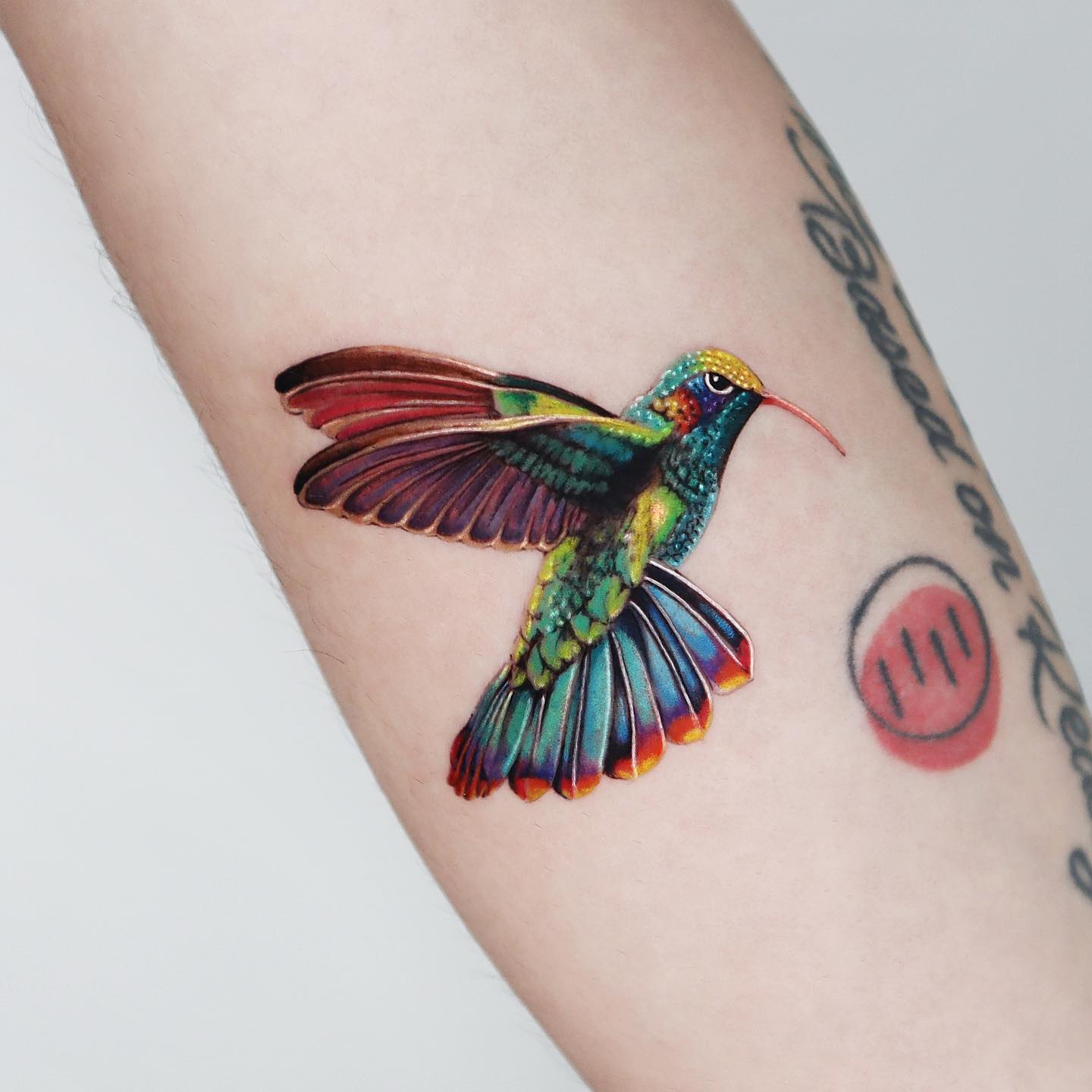 Colorful 3D Hummingbird Tattoo on Arm