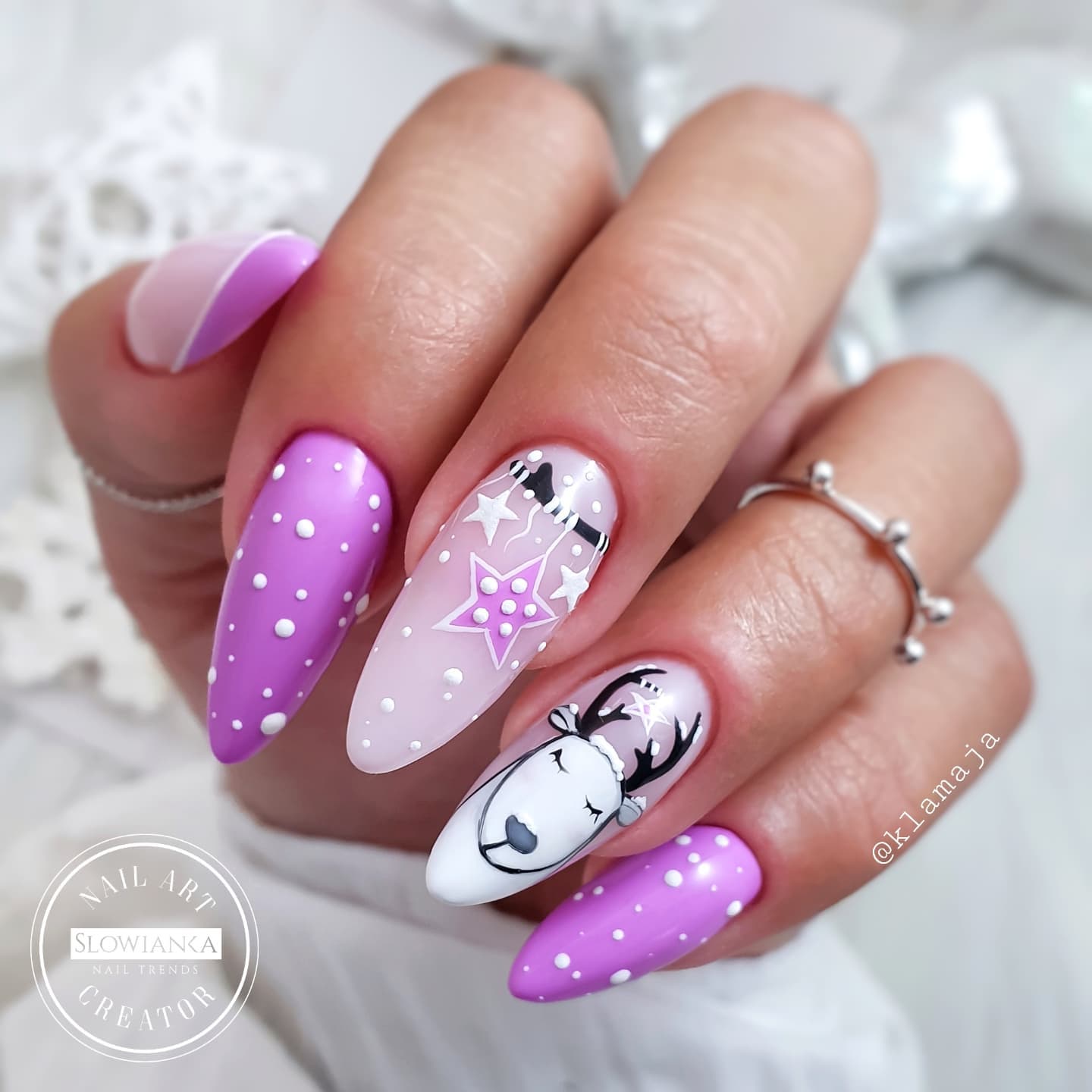 Long Purple Nails with Reindeer Design