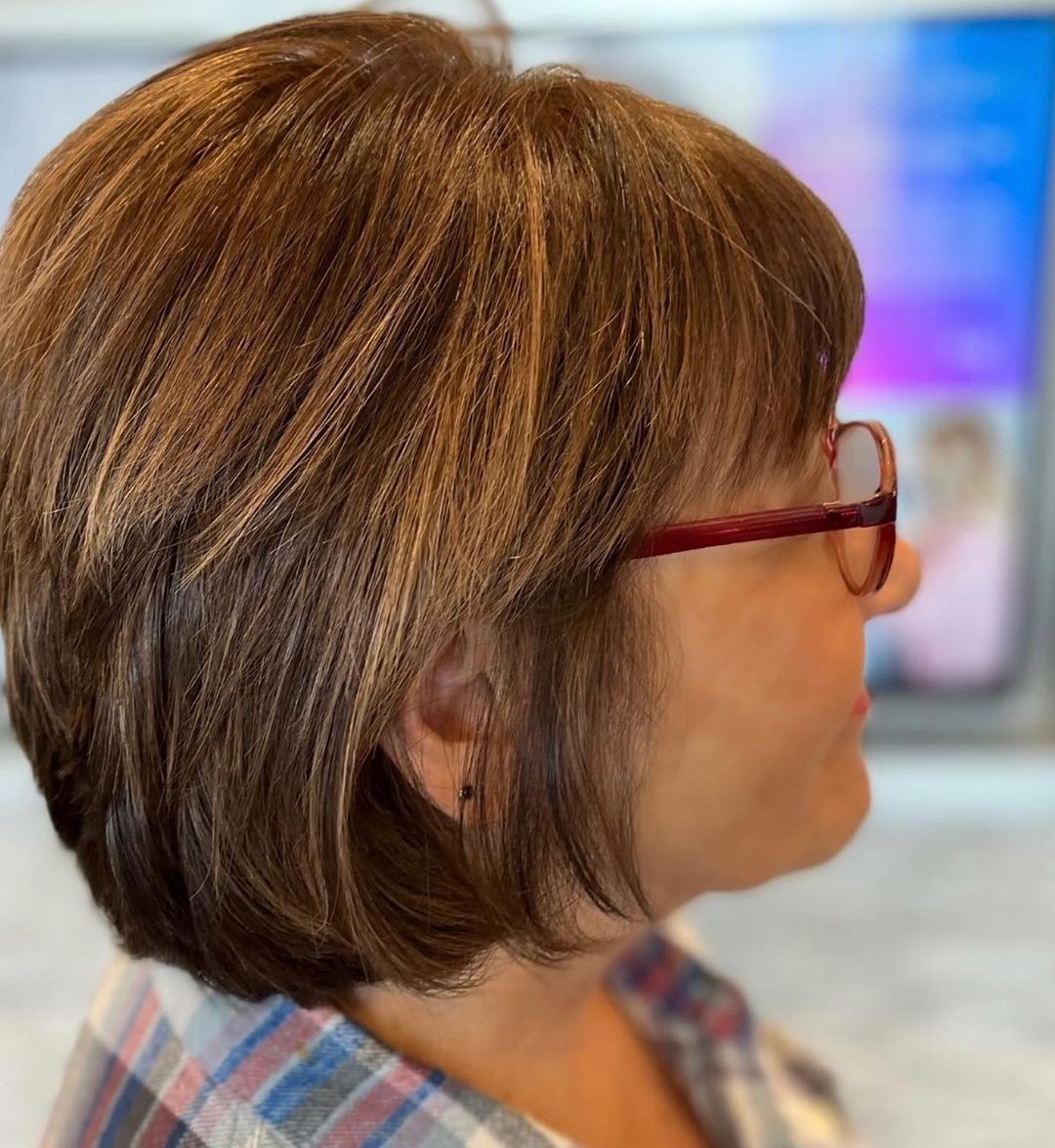 Layered Bob With A Fringe And Glasses