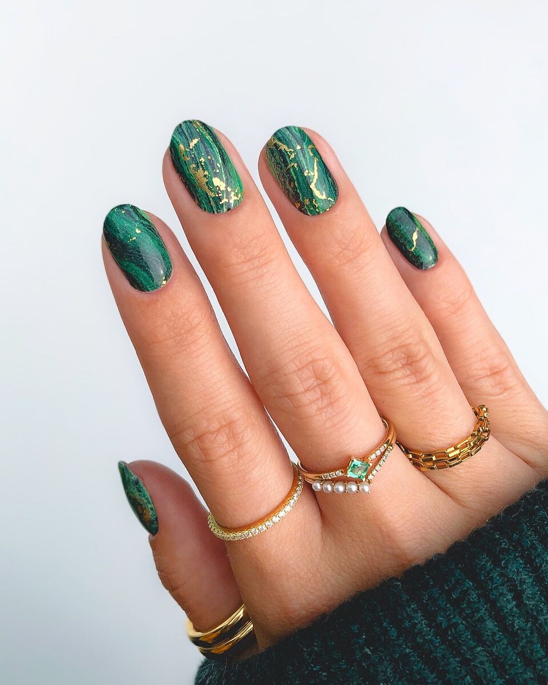 Short Emerald Nails with Gold Line Design