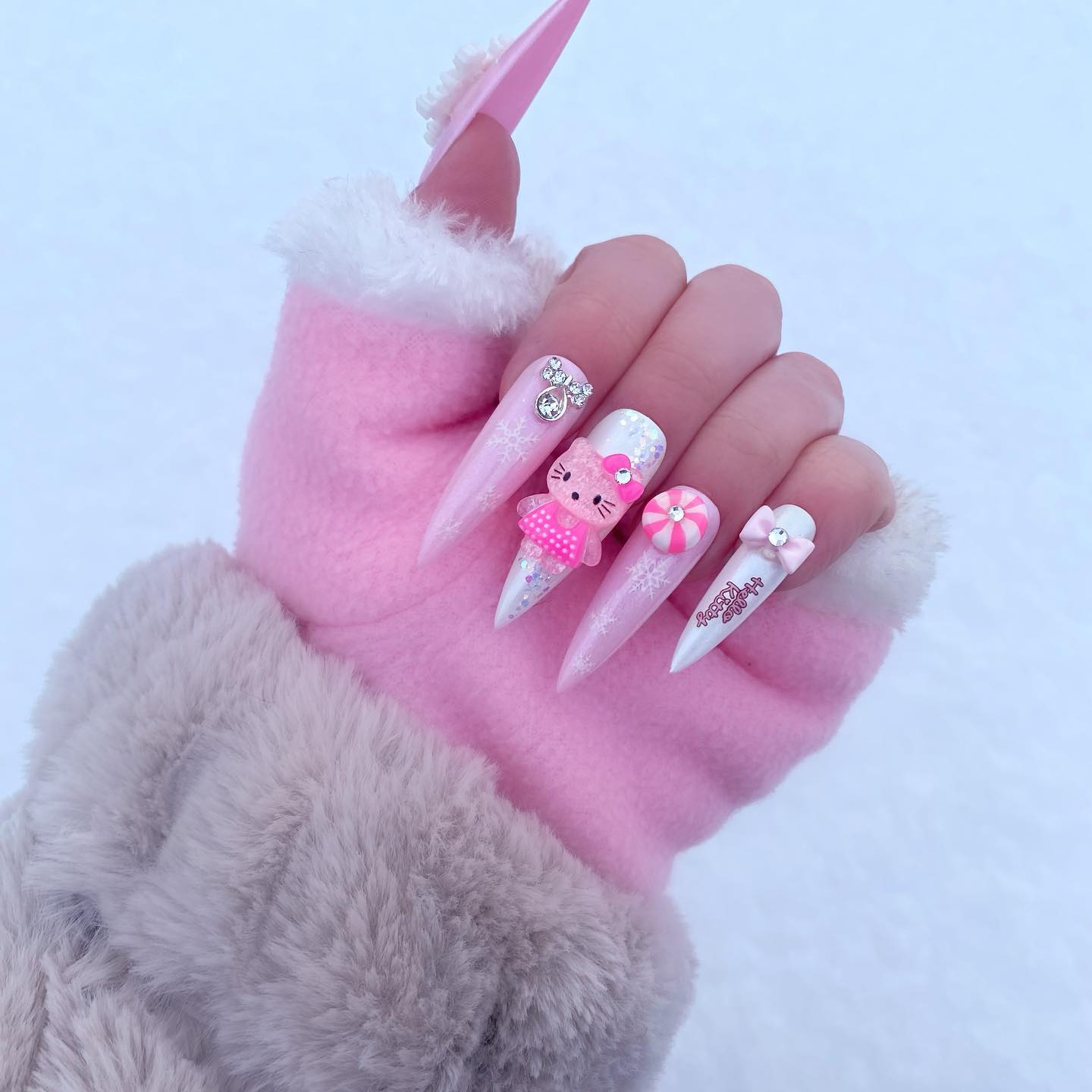 Pink Acrylic Nails with White Snowflakes
